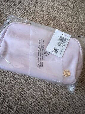 lululemon athletica Light Pink Cosmetic Pouch with Logo